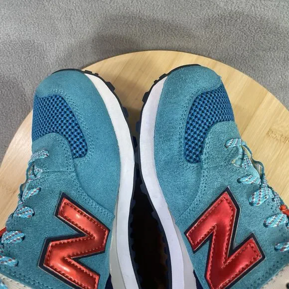 New Balance 574 Women’s Size US 10 B Blue Orange Shoe Sneaker Athletic WL574SMB - Picture 11 of 16